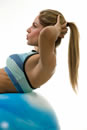 fit woman on swissball image